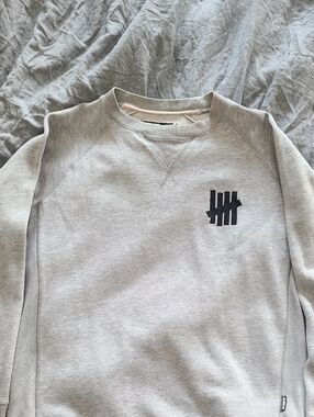 Undefeated Light Gray Crewneck Sweatshirt with Black Logo